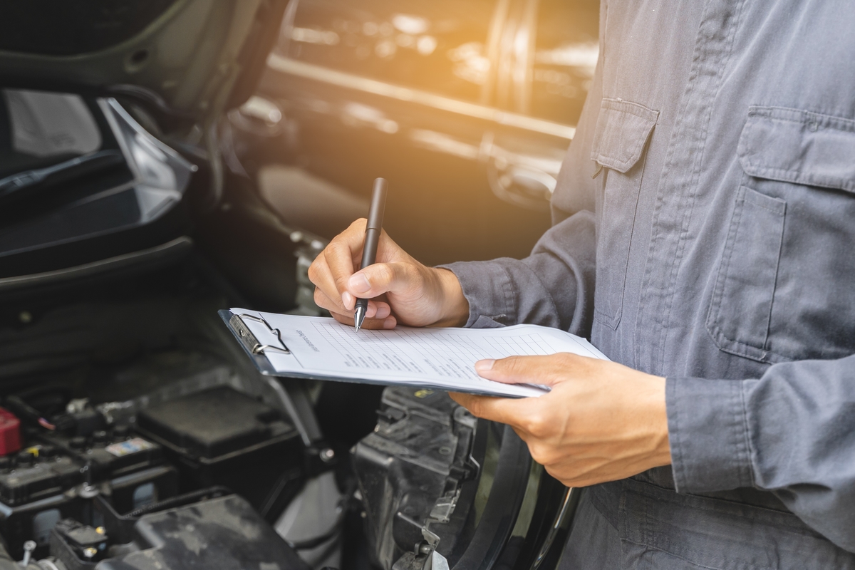 Mechanic with checklist